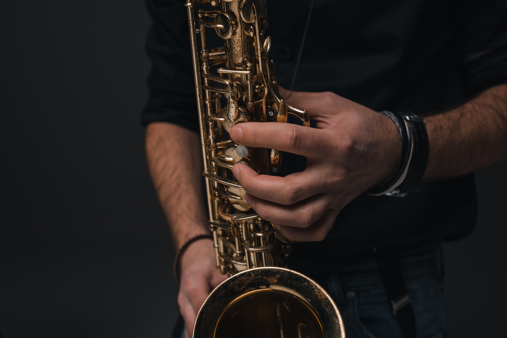 cropped shot of jazz musician playing saxophone